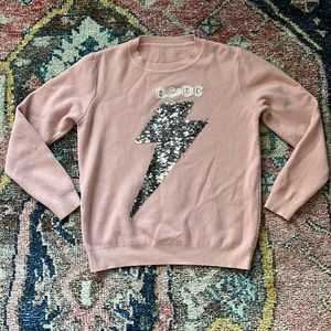 Pink AC/DC sweatshirt.